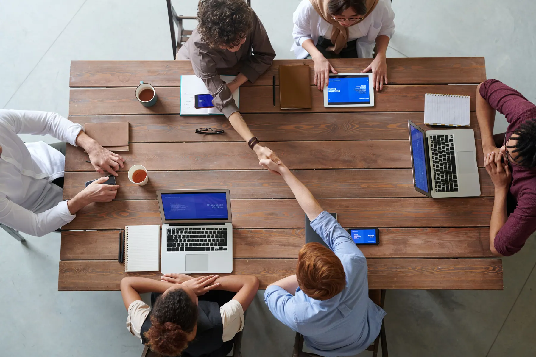 Business specialists discussing a project in a meeting
